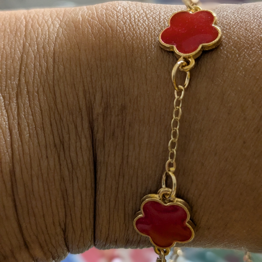 Chic Gold Bracelet with Red Floral Charms